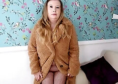 British big beautiful woman Hayley feels so sexually excited in a fishnet full bodystocking and her faux furry coat.