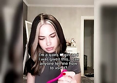 Trans angel holds pink toy and asks for aid using it ?