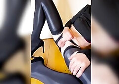 nicely clothed in ebony underware and heels I massage my ramrod until my goo squirts over my foot. Little lewd slide-up.......