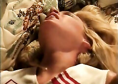 Glamorous golden-haired takes off her cheerleader suit and bangs a youthful chap in the bedroom